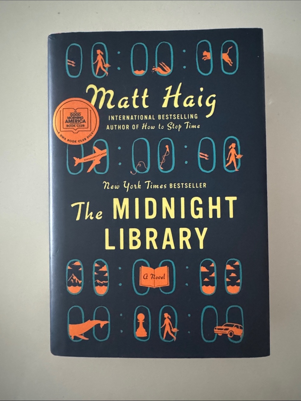The Midnight Library by Matt Haig - Navy & Yellow Hardcover
